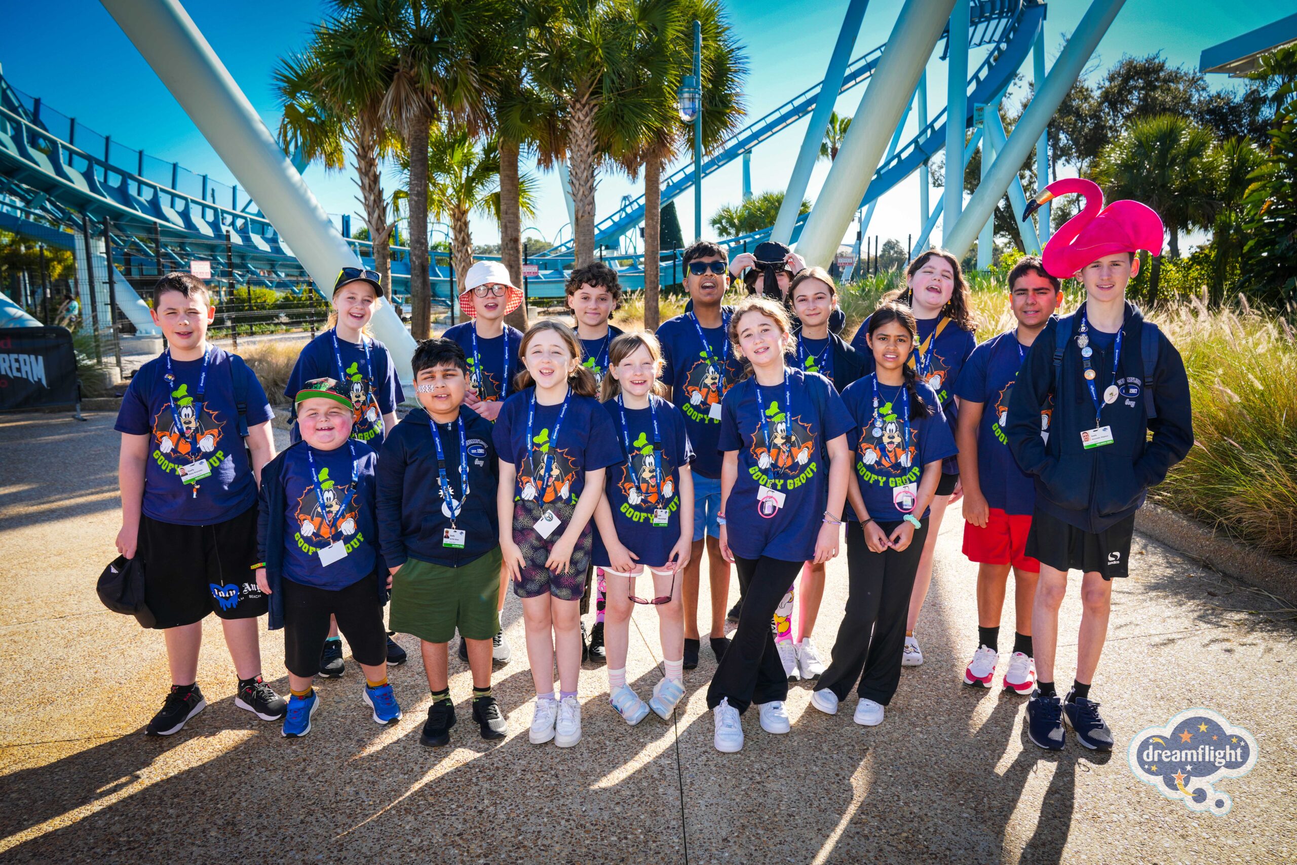 Lucas with his Goofy group peers at SeaWorld, smiling at the camera for a group photo